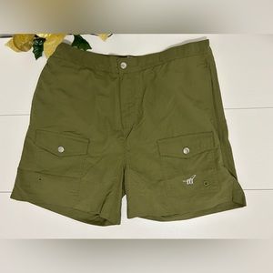 Henry Cottons green swim trunks.